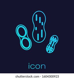 Turquoise line Peanut icon isolated on blue background.  Vector Illustration