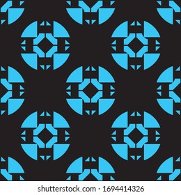 Turquoise pattern on black seamless backdrop.
