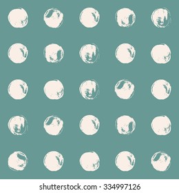 Turquoise and white polka dot seamless pattern, grunge texture, hand painted brush strokes and dabs.