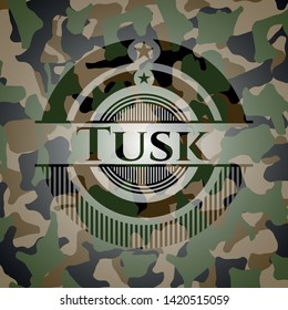Tusk on camouflaged pattern. Vector Illustration. Detailed.