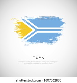 Tuva flag made in brush stroke background. Creative Tuva national country flag icon. Abstract painted grunge style brush flag background.