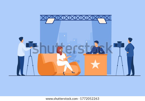 TV host interviewing celebrity\
person in studio. Camera crew working on talk show. Vector\
illustration for videographer job, broadcasting, news\
concept