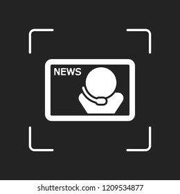 TV news with speaker. White object in camera autofocus on dark background