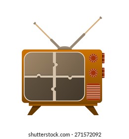 TV old look, with a broken screen on puzzle. With the antenna on it.