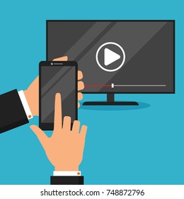 Tv set controlled via smartphone. Hand holds cellphone. Illustration in flat style.
