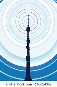 TV Tower transmits a radio signal on a background of blue sky.