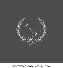 TW initial monogram wedding with creative leaf