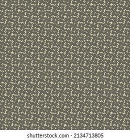 Tweed fabric texture. Pattern in gray and dark brown. Mottled background.