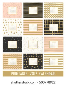 Twelve month 2017 calendar template. Hand drawn patterns in black, gold, pastel pink and cream.
