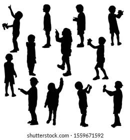 Twelve silhouette of a child that plays; vector illustration