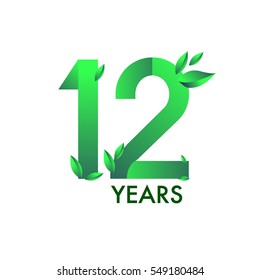 twelve years anniversary celebration logotype with leaf and green colored. 12th birthday logo on white background