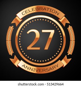 Twenty seven years anniversary celebration with golden ring and ribbon.