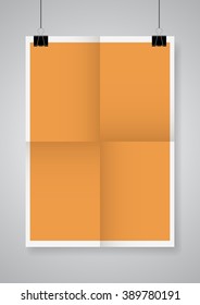 Twice a folded orange poster with clamps. Vector illustration.