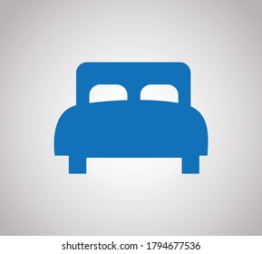 Twin bed icon with soft blanket and pillows. Isolated vector sign. Bedroom spictogram