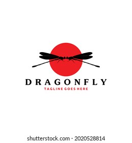 Twin Dragonfly Wings with Red Sun as a Background Logo Design