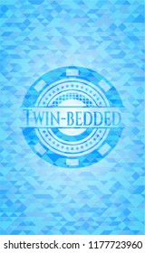 Twin-bedded sky blue emblem with triangle mosaic background