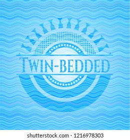 Twin-bedded water representation badge.