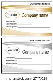 two abstract business cards are in a gold and silver color