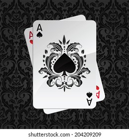 two aces playing cards on black seamless damask pattern(spades overlies)