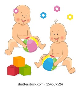 Two adorable smiling newborn babies playing with toys