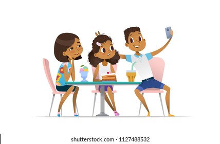 Two African-American girls and boy meeting at the cafe a and taking selfie. Teenagers friends at the restaurant taking photo on phone. Smiling students having coffee-break and taking self-portrait.
