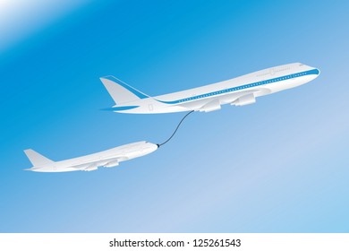 Two aircrafts in flight with fuel feeding hose