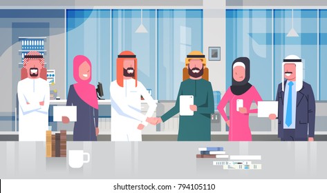 Two Arab Businessman Leaders Handshake Over Team Of Muslim Business People In Modern Office Partnership And Agreement Concept Flat Vector Illustration