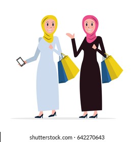 Two Arab women coming out of shopping with bags. flat character design. vector illustration