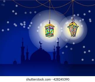 Two Arabic Lanterns or Fanous hanging on threads and shine. Mosque with minarets and the night sky background. Greeting card for Ramadan Kareem, Eid Mubarak