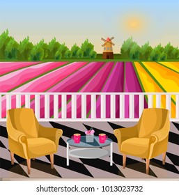 Two armchairs Terrace view. Rural background with Mill and flower fields