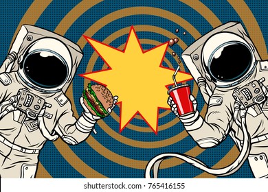 Two astronauts are eating lunch fast food. Pop art retro vector illustration