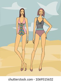 two attractive women in swimsuits on the beach