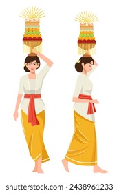 Two Balinese woman carrying offerings on their heads