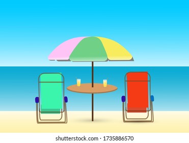 Two beach chairs and an umbrella on the beach  with lemon juice on the table. Background of blue sea in sunny day.