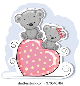 Two Bears is sitting on a heart on a blue background
