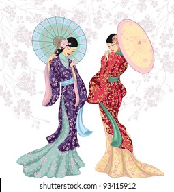 Two Beautiful Chinese Women With Umbrellas Isolated Over White