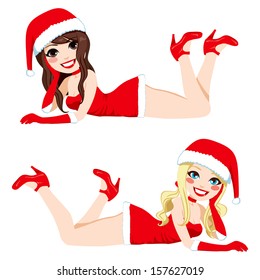 Two beautiful women lying down with sexy Santa Claus dress costume