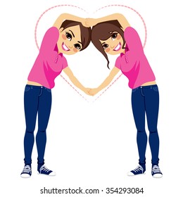 Two Beautiful Young Girls Making Love Shape With Arms Together With Pink Shirt Uniform And Blue Jeans On Valentine Day