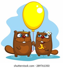 Two beaver with a yellow ball