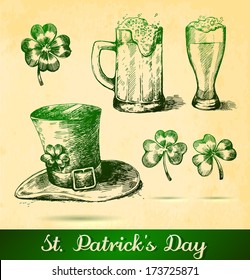 Two beers with clovers for St Patrick's day. St. Patrick's hat with four-leaf clover and paper background