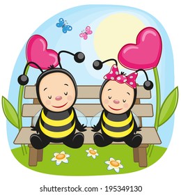 Two bees on a bench