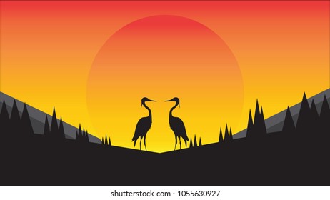 Two bird silhouettes standing Direct sun