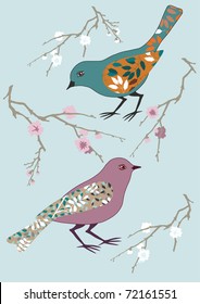 Two birds and blooming branch