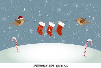 Two birds holding Christmas socks