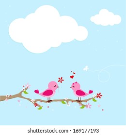 Two birds in love on a tree