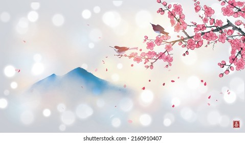 Two birds on blossoming sakura tree branch and far blue mountains. Traditional oriental ink painting sumi-e, u-sin, go-hua. Hieroglyph - joy.