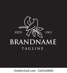 two birds on branch icon isolated on black background