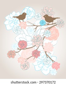 Two birds on a flowering branch with beautiful delicate flowers