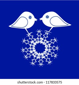 two birds on a snowflake