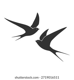 Zwei schwarze Vogelsilhouetten, die Schwalben oder Schnabeltieren ähneln, sind in anmutigem Flug auf sauberem, weißem Hintergrund dargestellt und zeigen ihre eleganten Formen.
